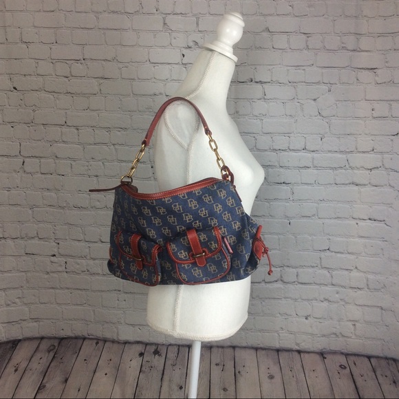Dooney & Bourke Handbags - Dooney and Bourke denim bag with red trim